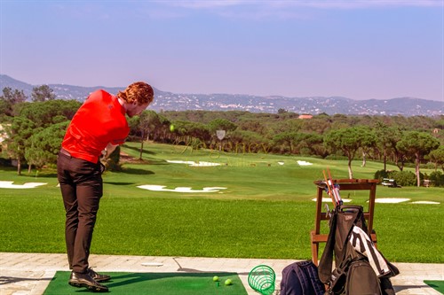 Guy Golfing Red